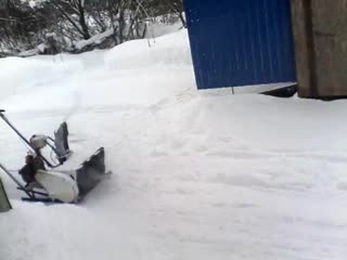 testing a homemade chainsaw snow blower