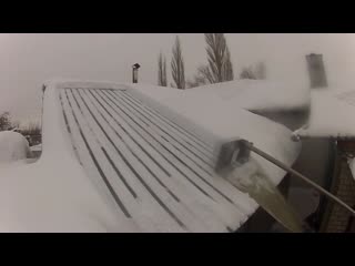 do-it-yourself scraper for cleaning snow from roofs